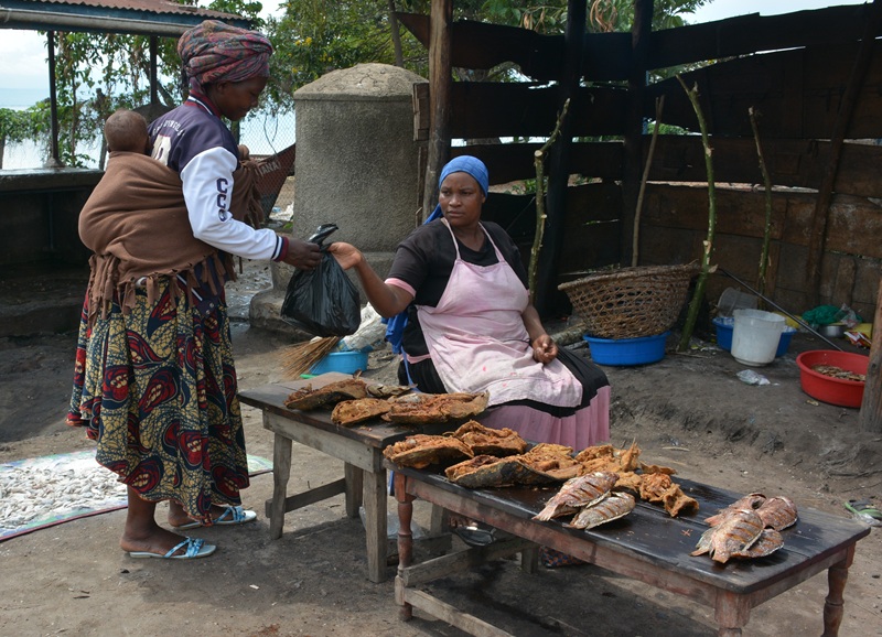 Women sell fish at the site